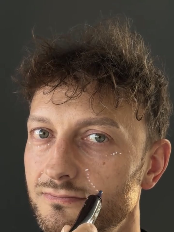 Krystian applying Lancôme eye serum